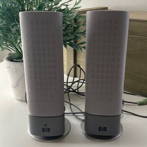 Hewlett-Packard portable speakers.   